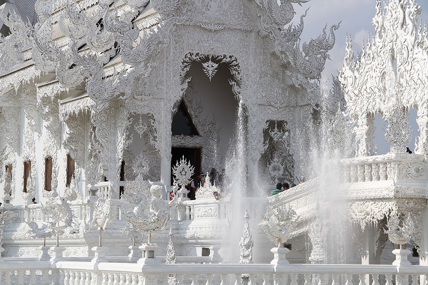 Wat Rong Khun, better known as the White Temple, is a Buddhist temple in Thailand that looks like it came down from heaven.