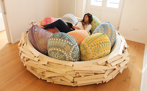 Giant Birdnest: Wooden Bed Filled With Soft Egg-Shaped Pillows