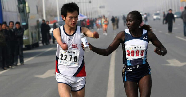 Jackline Kiplimo helps a disabled runner to finish a marathon in Taiwan, costing her a first place finish