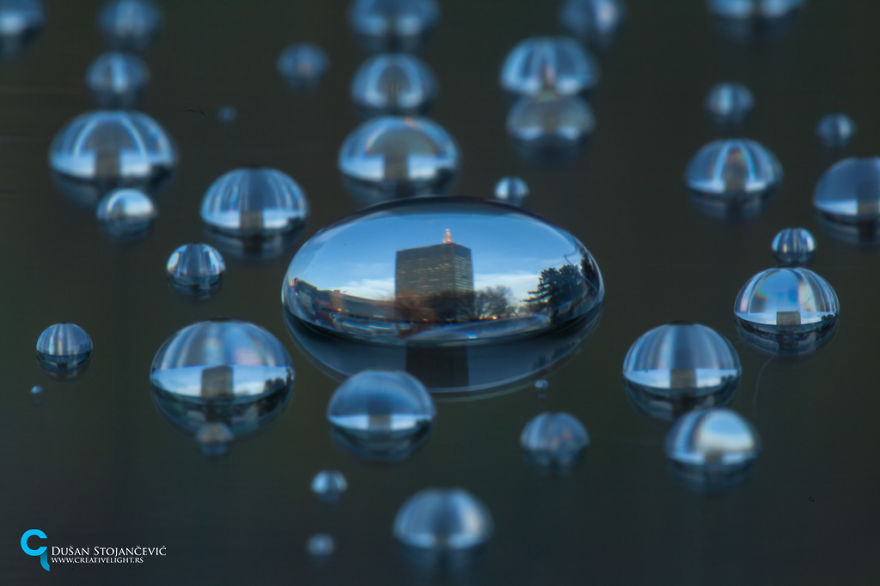 Dusan Stojancevic - Fotografowanie miast w kropli deszczu. Dusan Stojancevic - Photographing cities in water drops.
