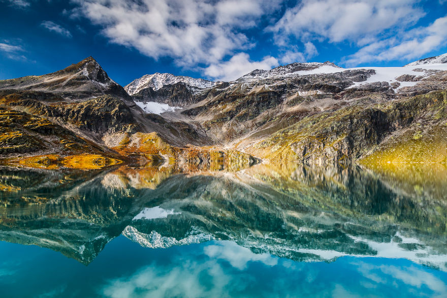  mountain mirrors photograph lakes surrounded mountains 