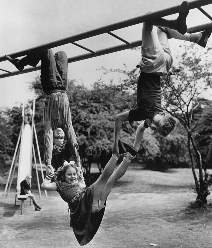 This Girl From Finchley, North London, Shows No Fear Of Being Dropped By Her Two Friends As They Play, 1954
