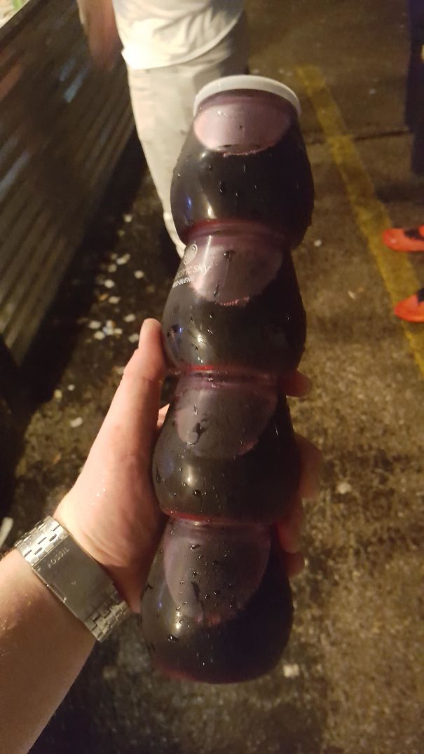 This Is How They Sell Wine Bottles At This Music Festival. 4 Cups That Come Apart