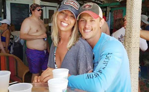 Couple Asks Internet To Photoshop Out Shirtless Guy From Engagement Photo, Regrets It Immediately