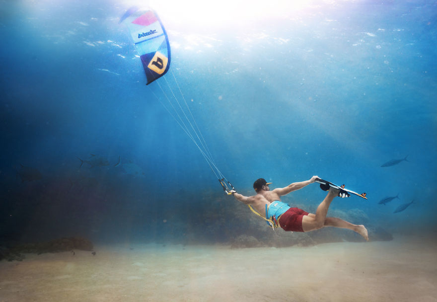  kitesurfing deep under ocean 