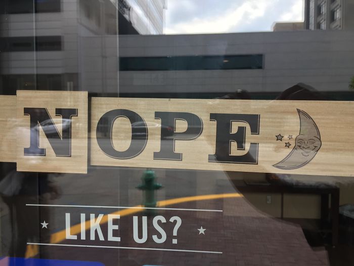 This Use Of The N In An Open Sign At A Café