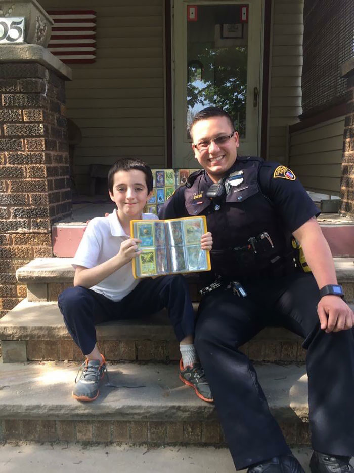 Yesterday, This Kid Had His Pokemon Card Collection Stolen Right Out Of His Hands. After His Shift, A Local Police Officer Went Home And Gathered His Own Collection To Give To The Kid