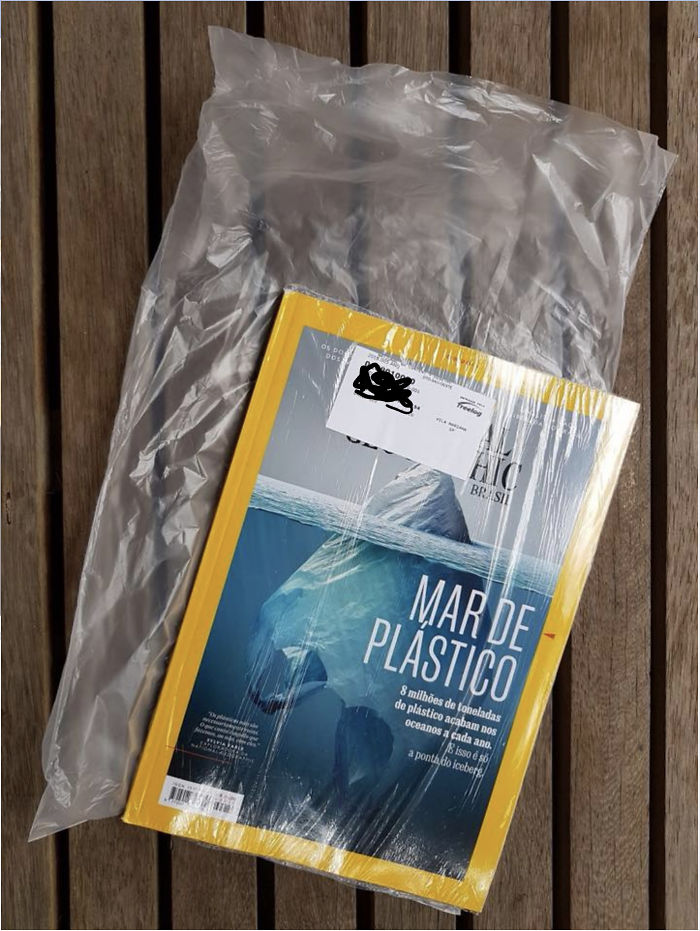National Geographic Magazine That Warns About Danger Of Plastic Bags Comes Inside A Plastic Bag That Is Inside A Plastic Bag