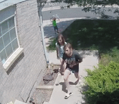 Three Colorado Children Found A Wallet On The Ground With $700 Stuffed Inside. They Are Seen On Surveillance Video Around Midday On July 18 Approaching The Front Door Of An Aurora Home, Where A Robotic Voice Tells Them To Leave A Message. They Tell The Messaging System They Had Found The Wallet Outside A Car And Were Returning It So No One Would Take The Money