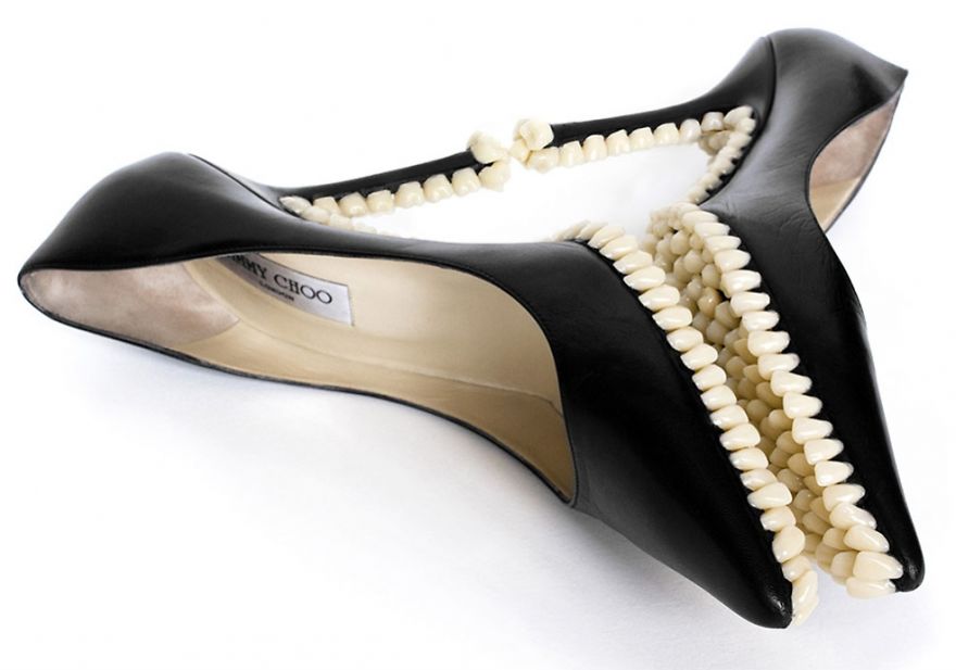 Bizarre Shoe Sculptures With Hundreds Of Artificial Teeth On Their Soles