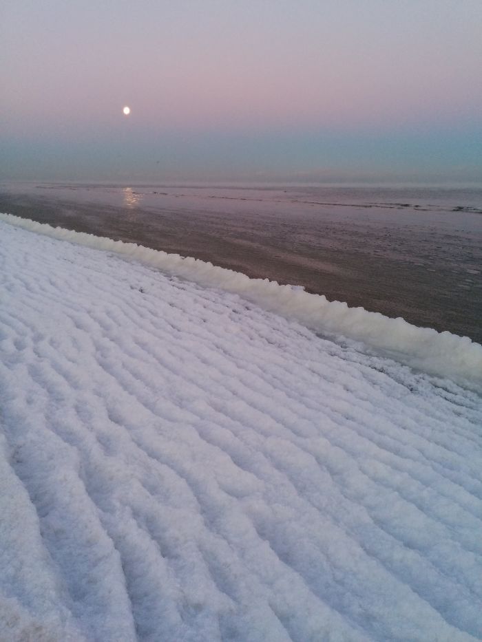 Frozen Beach Under A Full Moon In Latvia