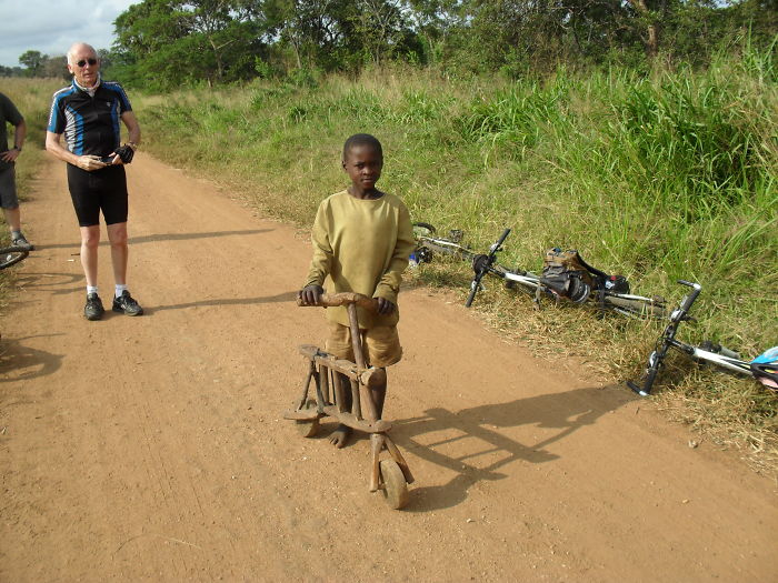 Tanzania, A Young Boy Proudly Shows Us His Bike