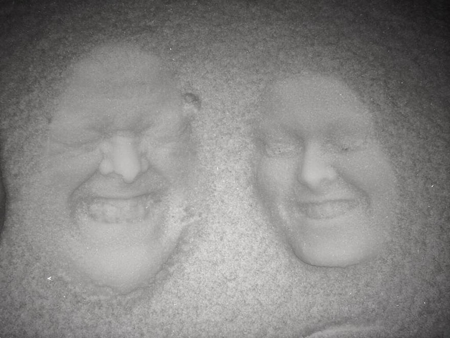 Forget Snow Angels - Father And Daughter Create 3D Images By Pressing Their Faces Into The Snow