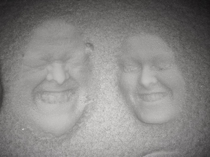 Forget Snow Angels – Father And Daughter Create 3D Images By Pressing Their Faces Into The Snow