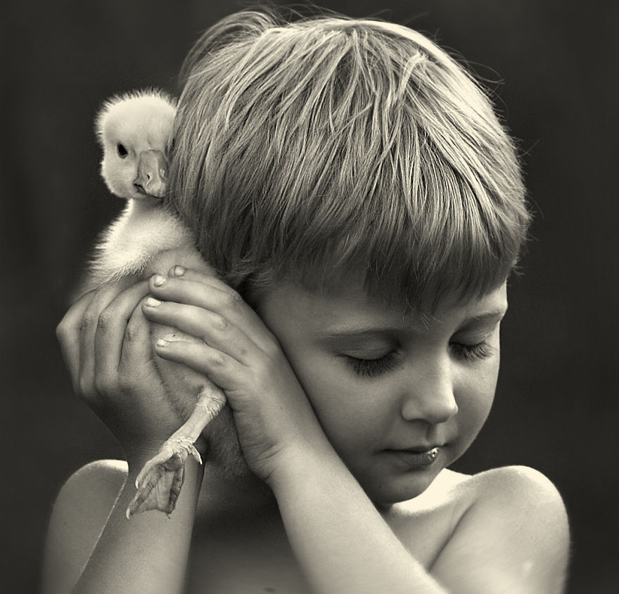 Russian Mother Takes Magical Pictures of Her Two Kids With Animals On Her Farm