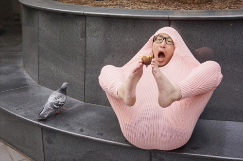 Freezing Japanese Guy Uses A Sweater To Turn Himself Into A Turkey
