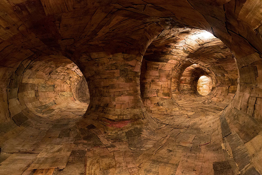 Artist Uses Repurposed Wood To Build Giant Root-like Tunnels You Can Explore From The Inside