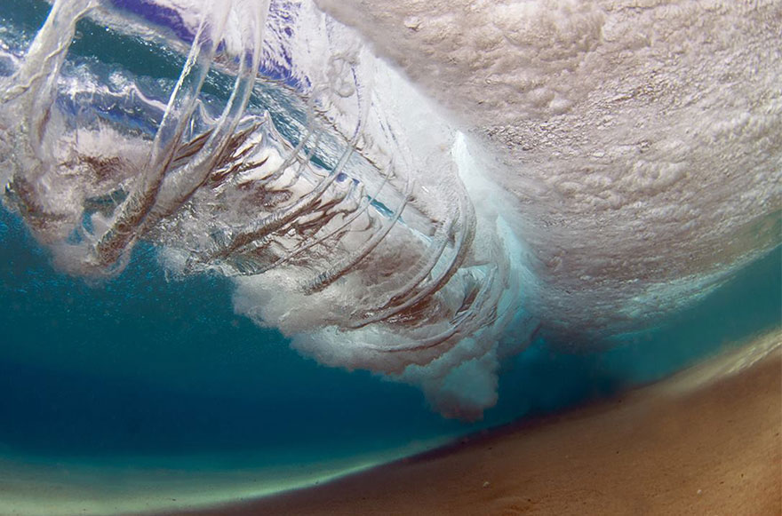 Photographer Dives Into Crashing Waves To Capture Their Raw Power From Within