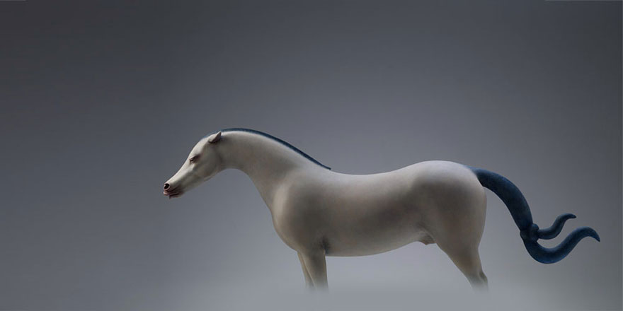 Surreal Animal Sculptures Carrying The World On Their Backs