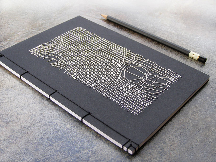 Artist Embroiders Notebook With Veins, Holograms, And Floral Patterns