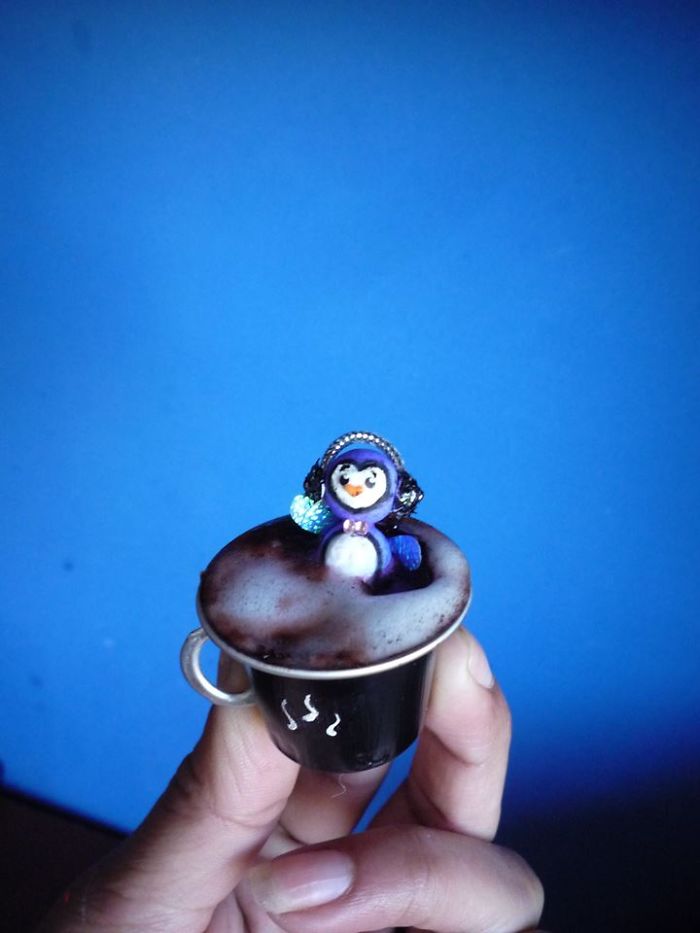 Miniature Stories On A Coffee Capsule