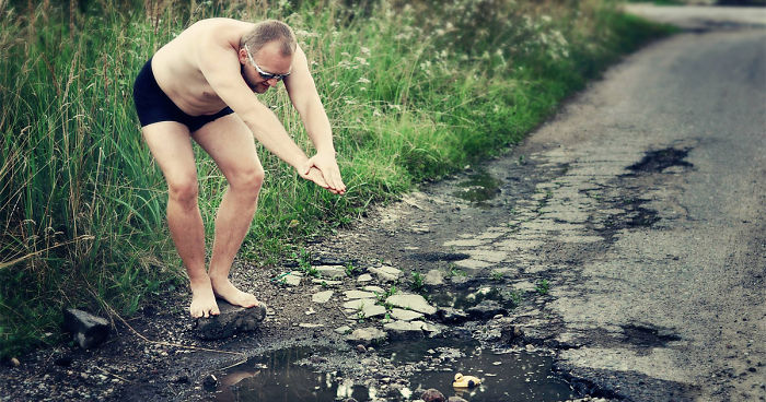 Friends Take Funny Pothole Photos To Draw Government's Attention To Poor  Road Conditions In Kaunas | Bored Panda