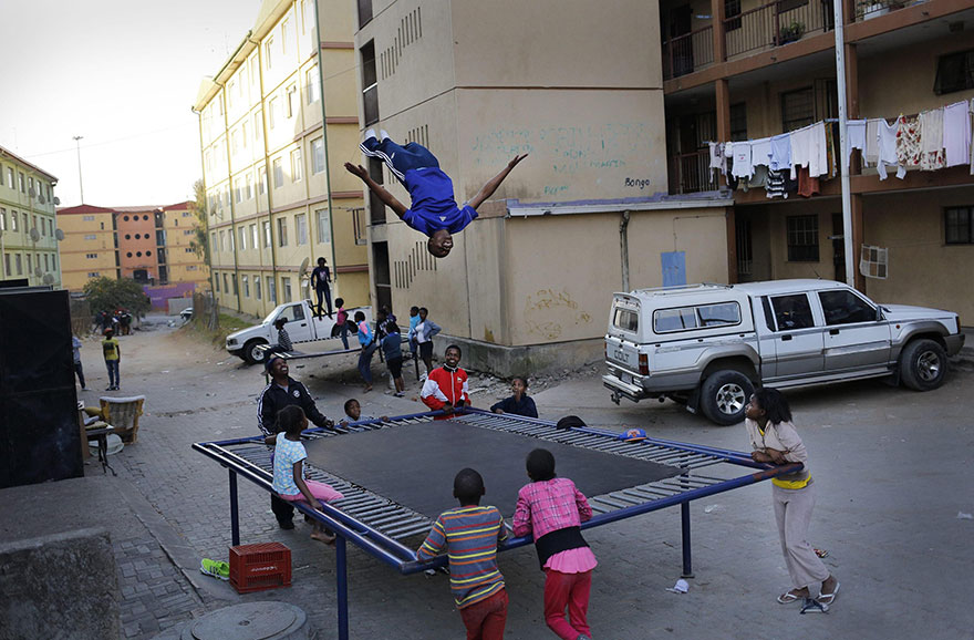 Kids From A Poor Part Of Johannesburg Receive A Trampoline And Soar Through The Air With Glee