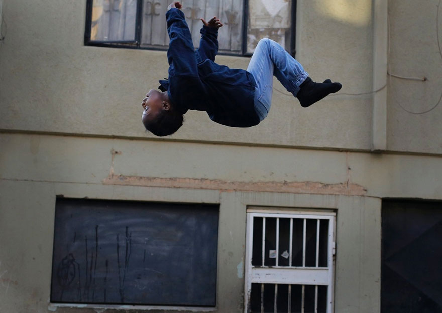 Kids From A Poor Part Of Johannesburg Receive A Trampoline And Soar Through The Air With Glee