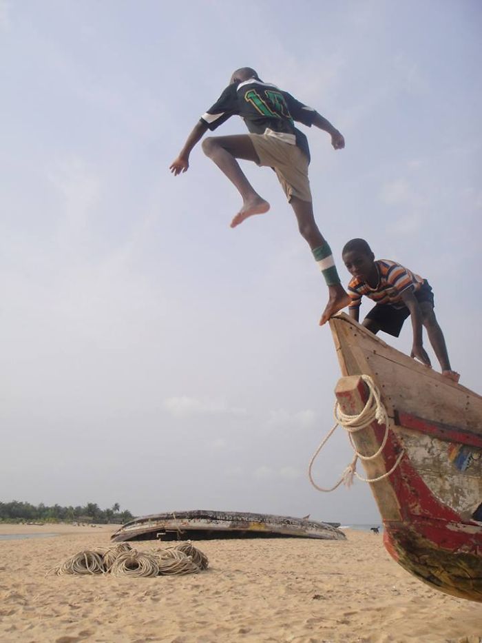 Ghana, Africa. Jumping Off Boat.
