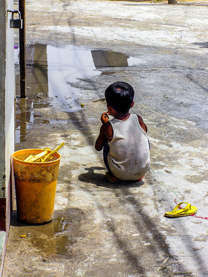 Kid Playing After Monsoon, Philippines