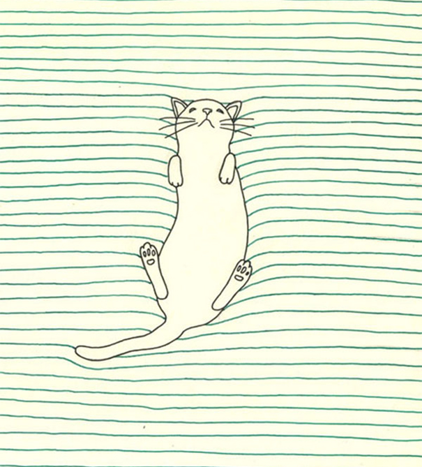 Cat Lying On A Lined Sheet