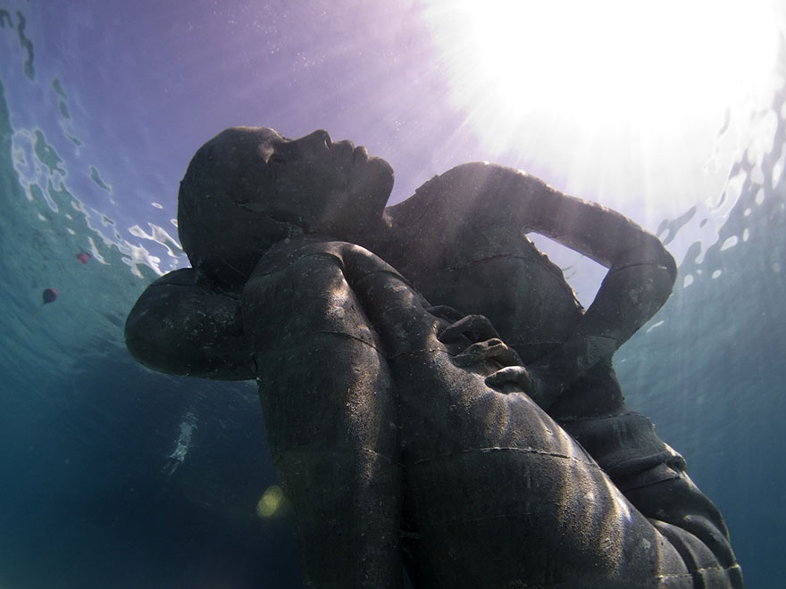 Ocean Atlas: Massive Underwater Statue Of Girl Carrying The Ocean On Her Shoulders