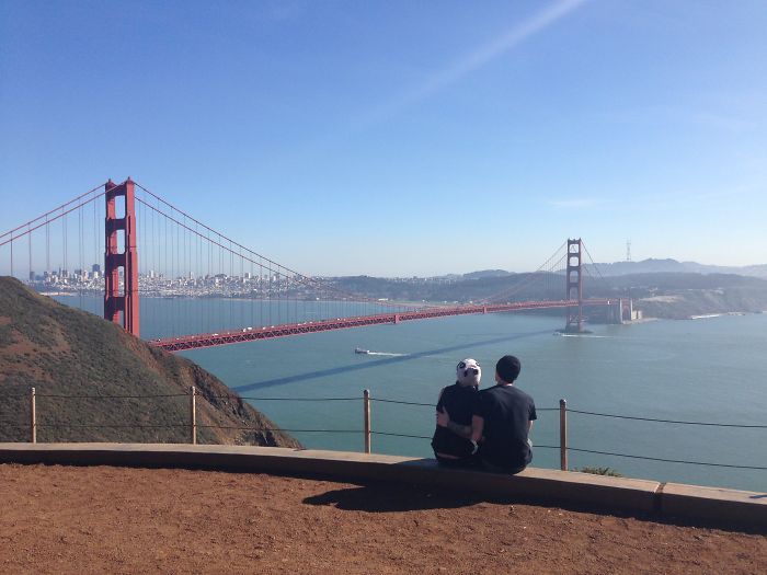 Couple Looks Out Over The San Francisco Bay. San Francisco, California