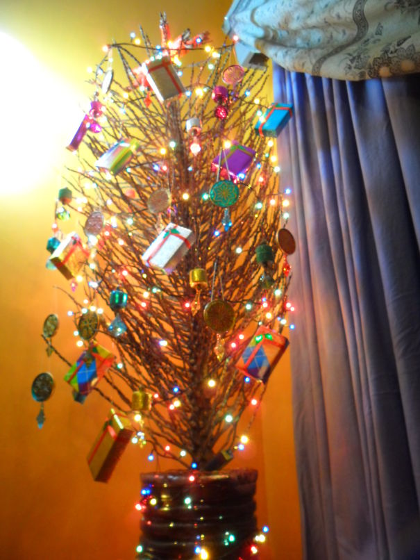Home-made Christmas Tree From A Coconut Branch, Decorated With Handmade Ornaments From Recycled