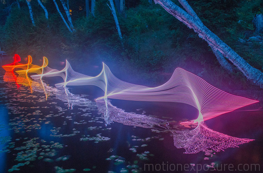 The Motions Of Canoers and Kayakers Revealed With LEDs In Long Exposure Photography