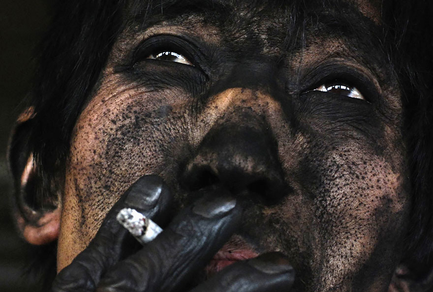 A Coal Miner Smokes A Cigarette After Finishing His Shift On The Outskirts Of Changzhi