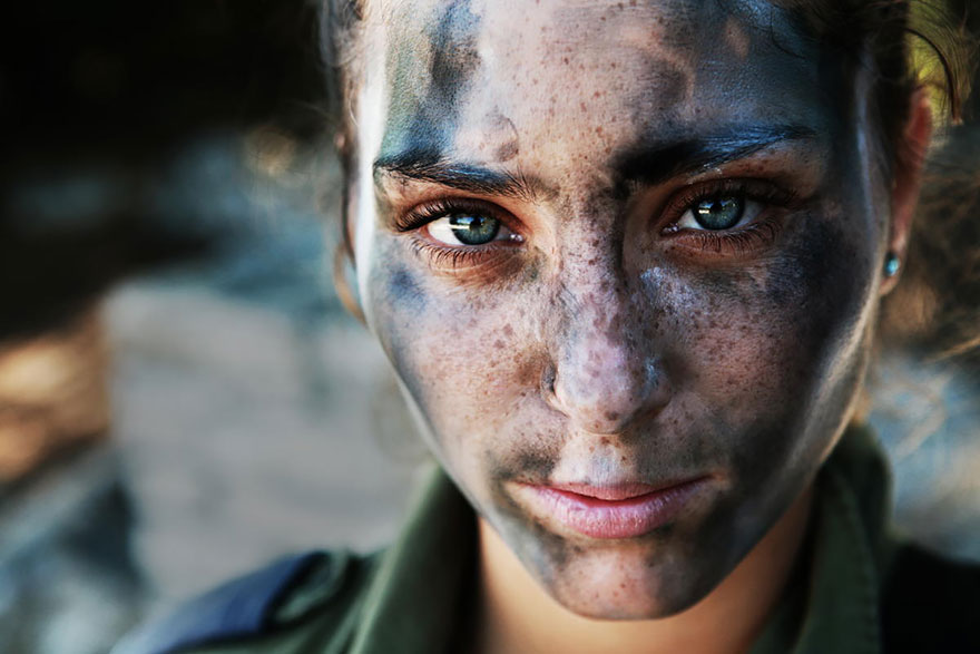 An 18 Year Old IDF Soldier Pauses After A Long Run In Full Gear And Battle Paint