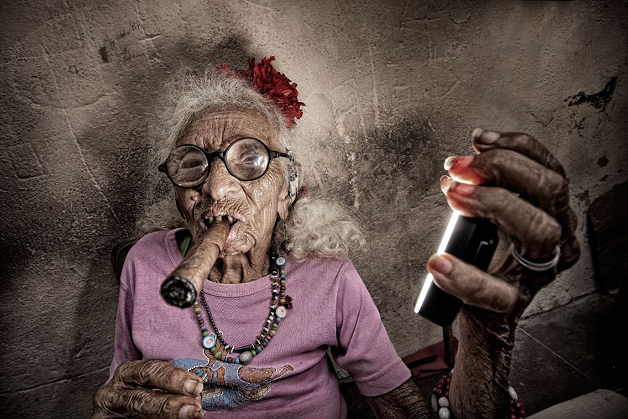 Cuban Woman Smoking A Cigar And Holding A Ring Flash