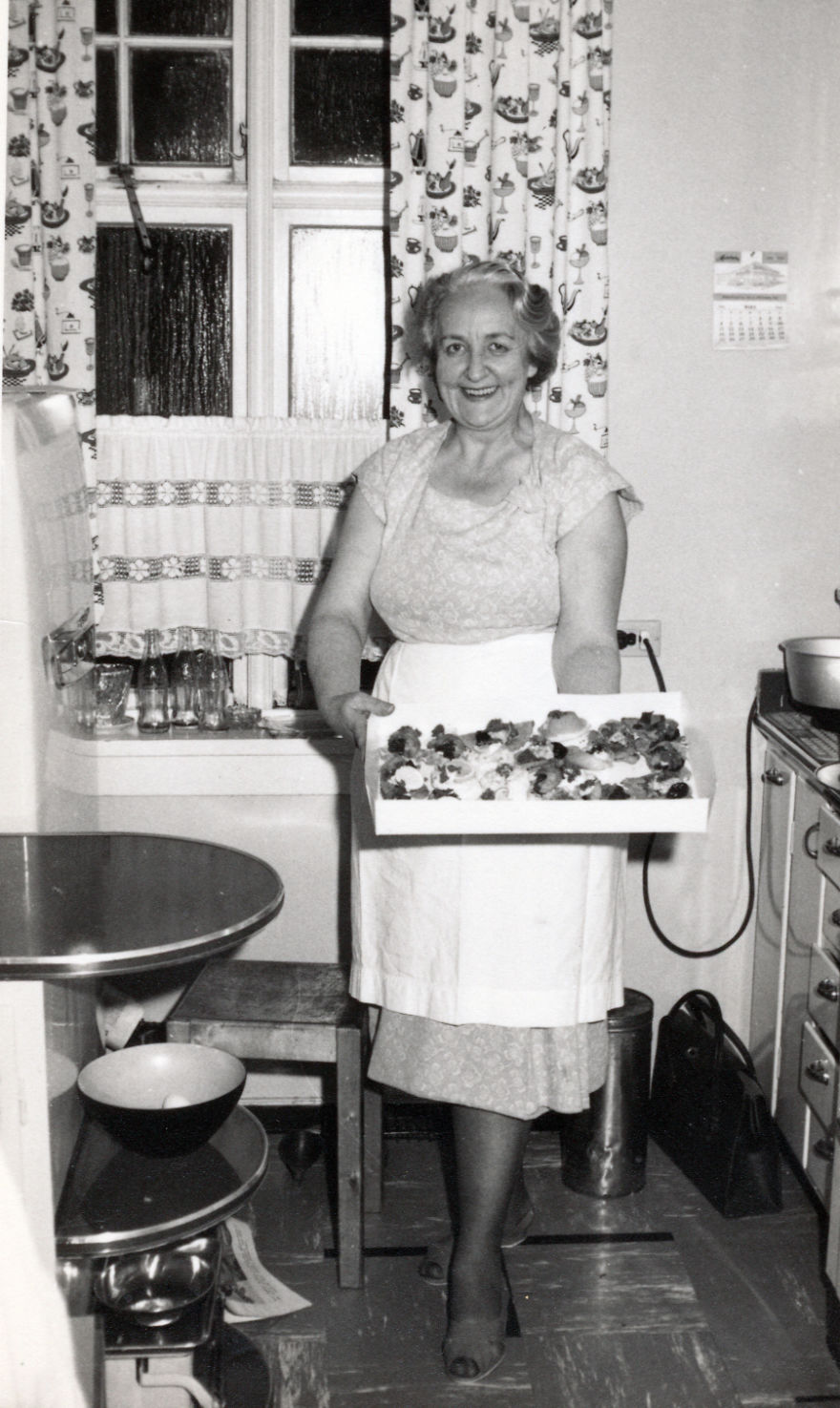 A Eldery Icelandic Woman Serving Sweets