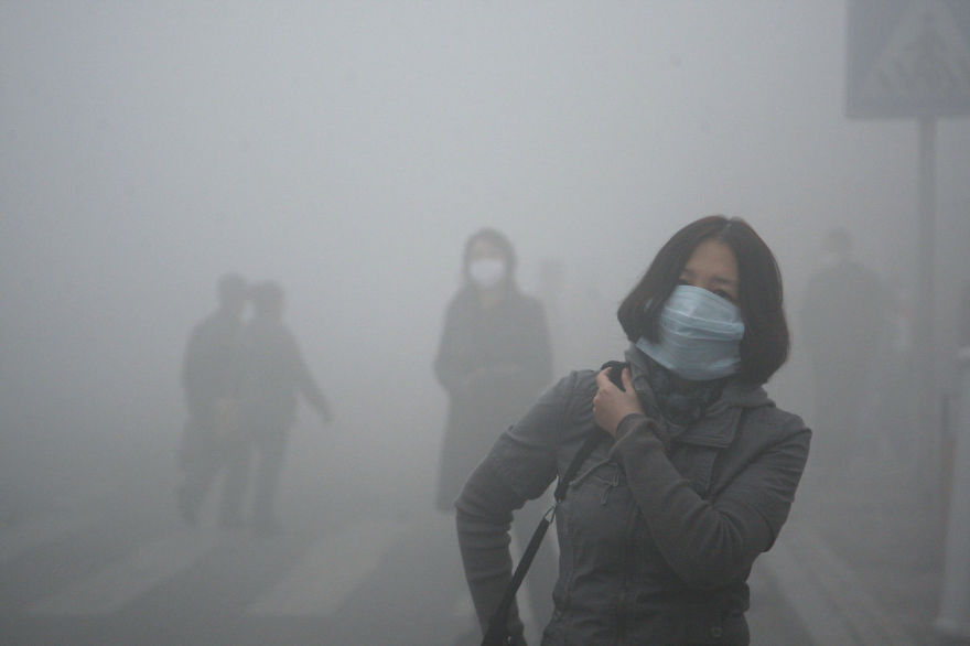 Girl Walks Through Smog In Beijing, Where Small-Particle Pollution Is 40 Times Over International Safety Standard