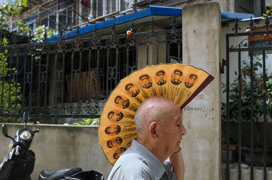 Self-Taught Chinese Street Photographer Takes China By Storm With His Perfectly Timed Photos