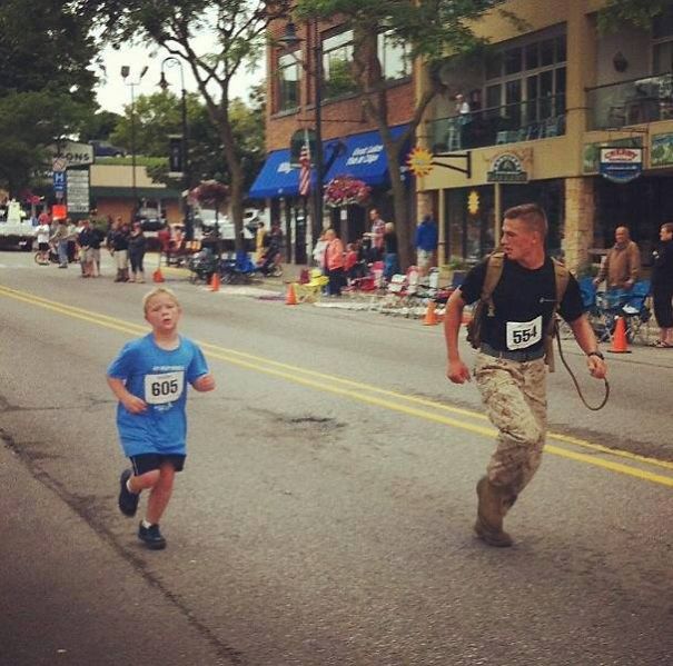 Marine Myles Kerr Finishes A Race Last To Help A Young Boy Who Got Separated From His Group