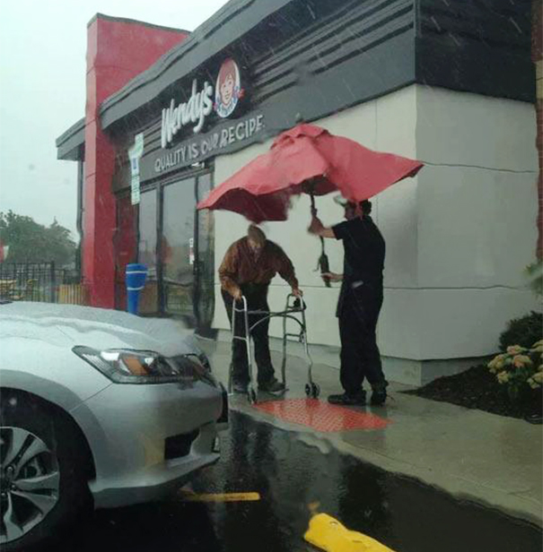 Wendy’s Employee Removes Umbrella From Table To Protect Elderly Man From Rain