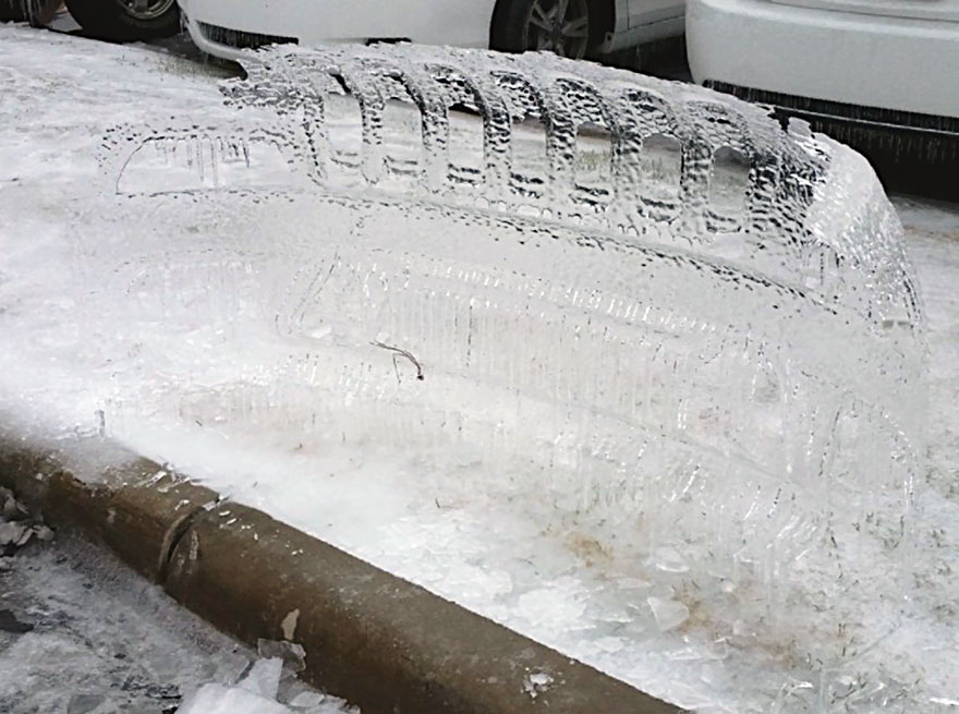 Frozen Cars Leave Icy Bumper Shells Behind After Ice Storm