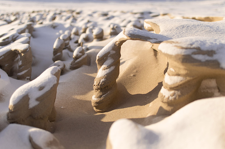 Wind Turns Frozen Sand Into Alien Towers On Lake Michigan Shore