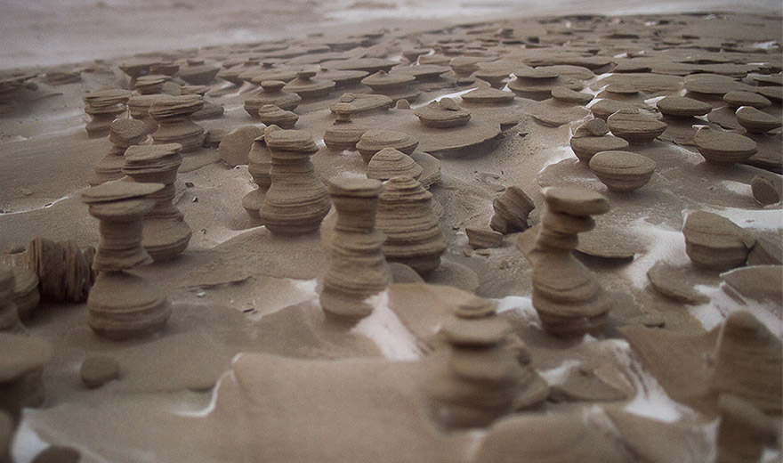 Wind Turns Frozen Sand Into Alien Towers On Lake Michigan Shore