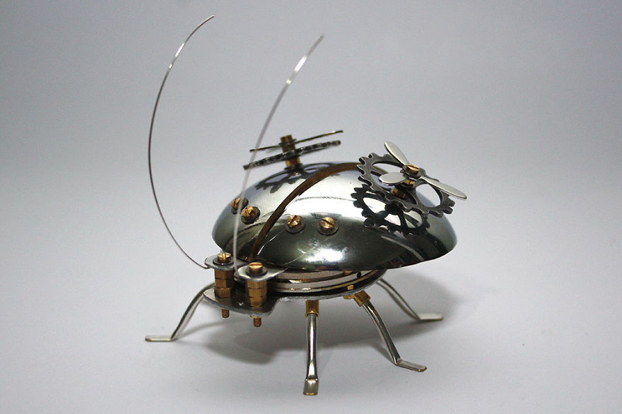 Beetle Sculpture Made From Recycled Materials And An Old Doorknob