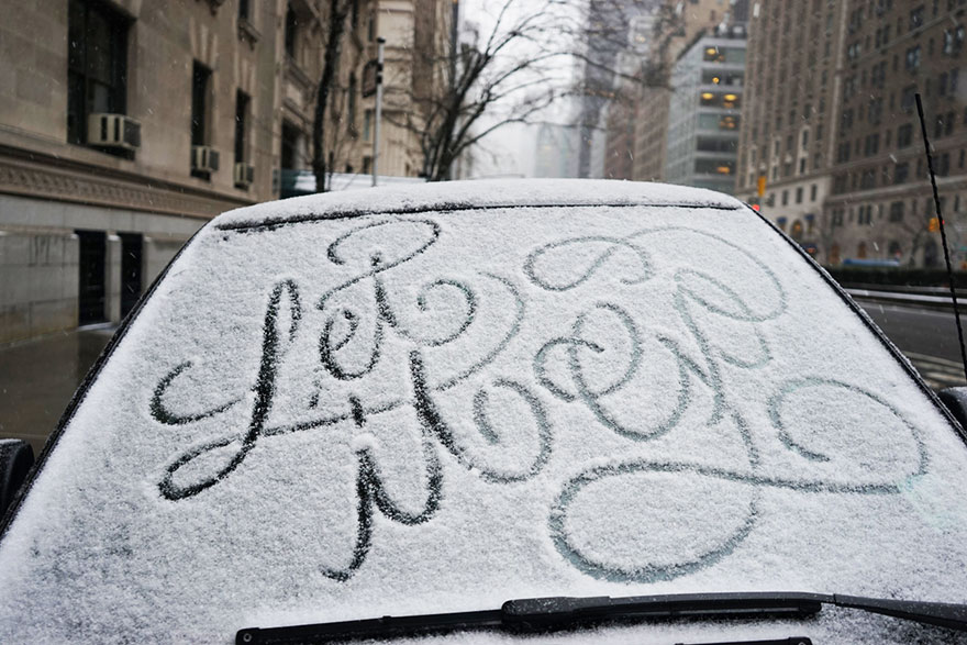 Mysterious Street Artist Leaves Beautiful Typographic Messages On Snow-Covered Cars in NYC