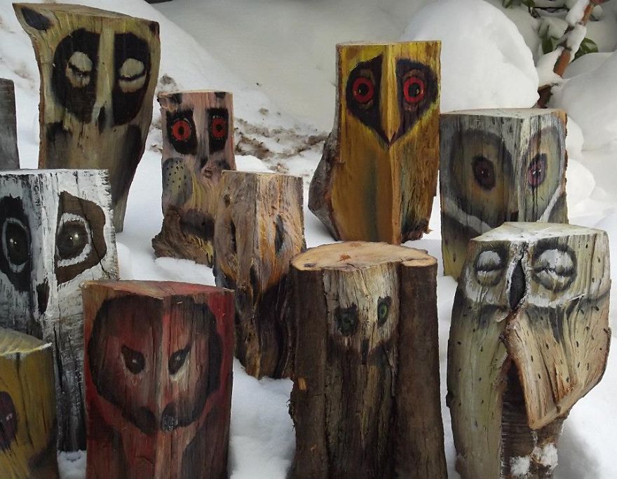 Owls On Wooden Logs