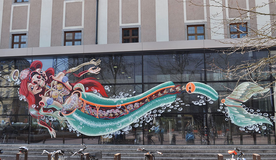 Street Art 'Surgeon' Cuts Open Cartoon Characters To Reveal Their Anatomy